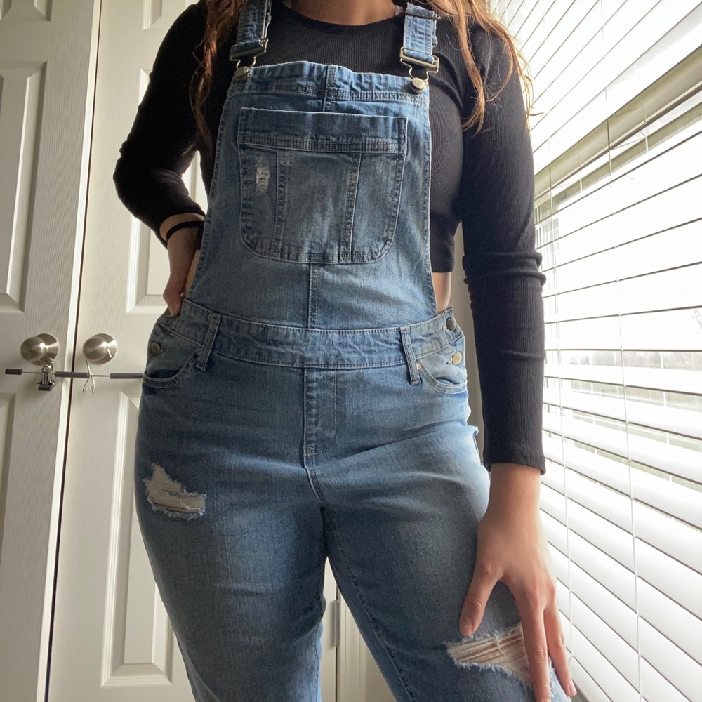 Cute denim overalls.  With buttons on the sides.